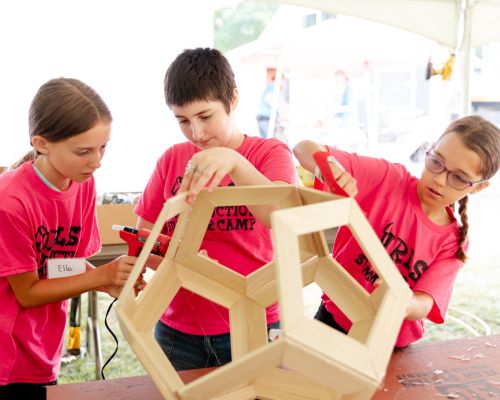 students participating in dodecahedron build